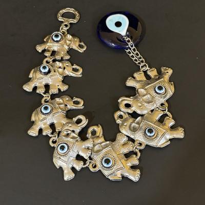 LOT 117: Lampe Berger Catalytic Fragrance Lamp, Red Resin Elephants, Lucky Elephants Wall Decor w/Turkish Evil Eye (Worry Bead),...