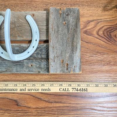 LOT 136: Horseshoe Rack with Collection of Western Memorabilia - John Wayne and Sally Star