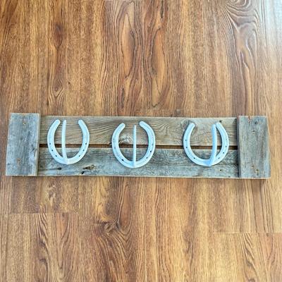 LOT 136: Horseshoe Rack with Collection of Western Memorabilia - John Wayne and Sally Star