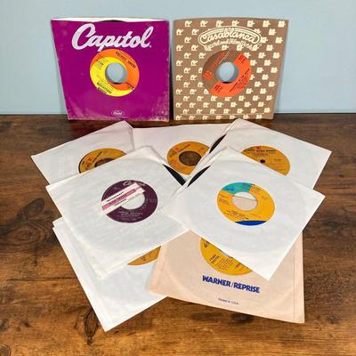 LOT 137: Entertainment Memorabilia Collection - Frank Sinatra, 45 Records, Wizard of Oz Book and Ornament, Life Magazines and More