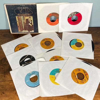 LOT 137: Entertainment Memorabilia Collection - Frank Sinatra, 45 Records, Wizard of Oz Book and Ornament, Life Magazines and More