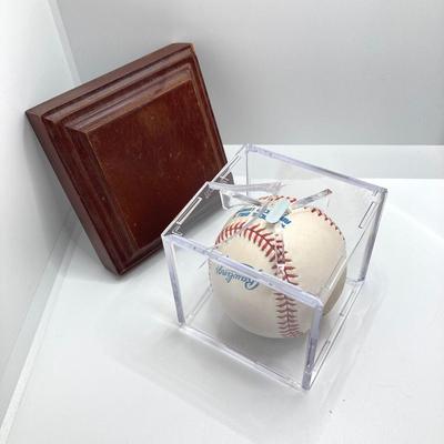 LOT 138: Autographed Robin Roberts HOF 76 Phillies Pitcher with COA and Numbered Bob Feller Ball HOF 62