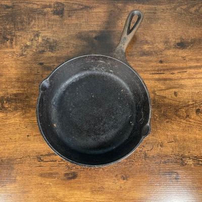 LOT 154: Three Cast Iron Skillets with Collection of Utensils / Gadgets