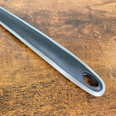 LOT 154: Three Cast Iron Skillets with Collection of Utensils / Gadgets