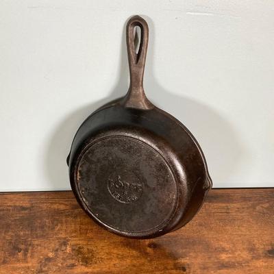 LOT 154: Three Cast Iron Skillets with Collection of Utensils / Gadgets