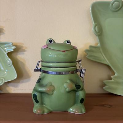 LOT 166: Wooden Adjustable Shelf & Floating Shelf along with Frog Ceramic Platers & Jar