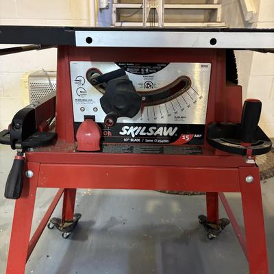 LOT 172: Skil 10-inch Table Saw on Stand & Adjustable Rolling Stand
