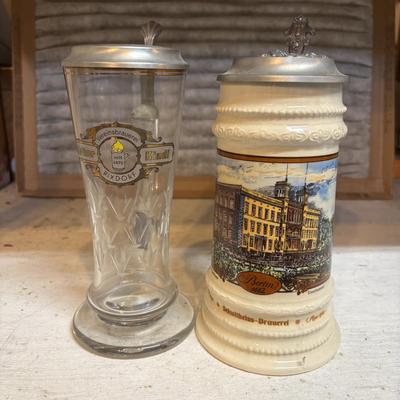 LOT 176: Vintage Steins, Local Growlers & More