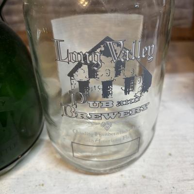 LOT 176: Vintage Steins, Local Growlers & More