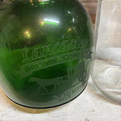 LOT 176: Vintage Steins, Local Growlers & More