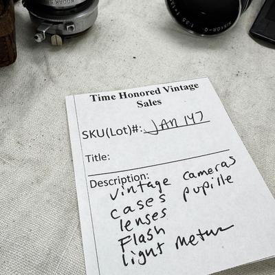 Vintage film cameras, cases light meters, flash lense