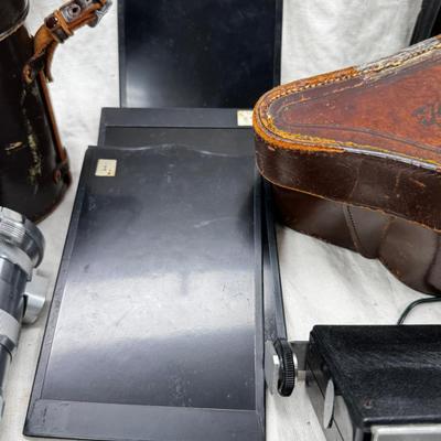 Vintage film cameras, cases light meters, flash lense