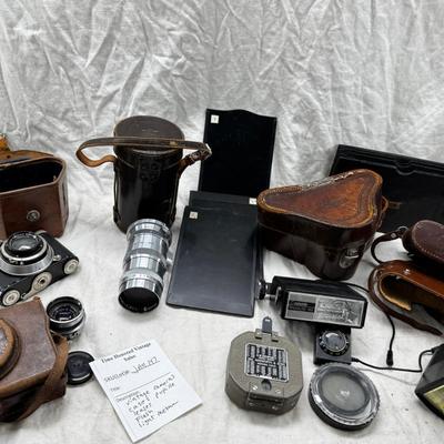 Vintage film cameras, cases light meters, flash lense