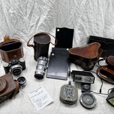 Vintage film cameras, cases light meters, flash lense