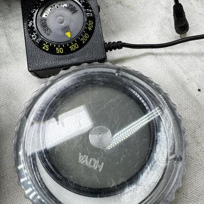 Vintage film cameras, cases light meters, flash lense