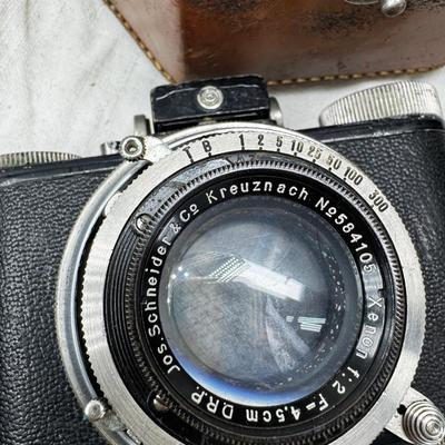 Vintage film cameras, cases light meters, flash lense