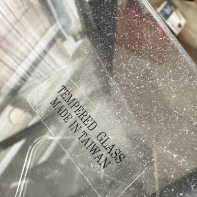 Modern metal and glass cascading 4 shelf on wheels