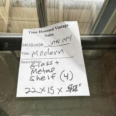 Modern metal and glass cascading 4 shelf on wheels