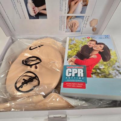 LOT 34: American Heart Association Family & Friends CPR Anytime Training Kit, HoMedics Cordless Percussion Body Massager with...