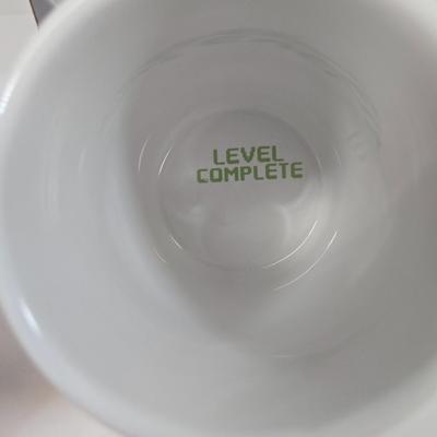 LOT 35: Wrenchware Knobby Tread Rubberized Tire Bowl, Spencer Gifts' 1996 Christmas Expo in Reno Budweiser Mug, Gamer Bowl &...