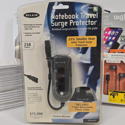 LOT 39: Notebook Travel Surge Protecter, Tech and Go Braided Earphones, Soleus Running Watch, Dashboard Phone Mount, Multiple Screen...