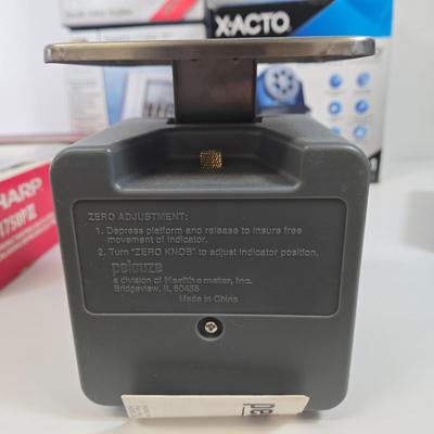 LOT 40: Home Office Lot Including Mechanical Postal Scale, Cross Classic Century Black Lacquer Ballpoint Pen, X-ACTO School Pro Electric...