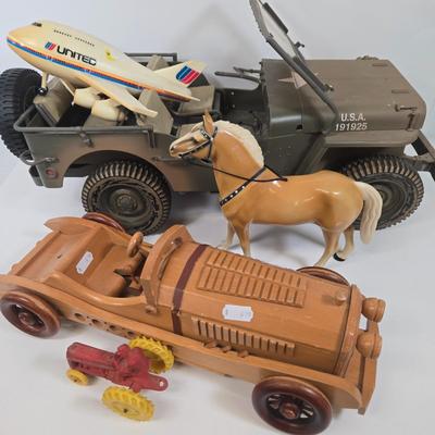 LOT 81: G.I. Joe 1941 Willys MB Jeep Toy, United Airlines Plane Toy, Wooden Model Car, Auburn Rubber Company Toy Tractor, and Plastic Horse