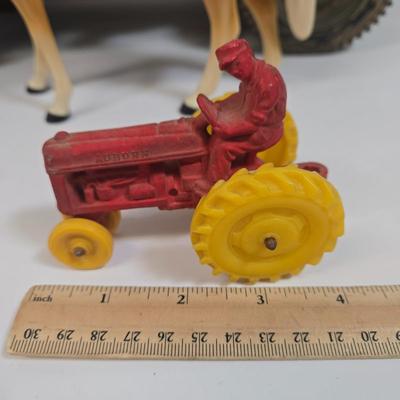 LOT 81: G.I. Joe 1941 Willys MB Jeep Toy, United Airlines Plane Toy, Wooden Model Car, Auburn Rubber Company Toy Tractor, and Plastic Horse
