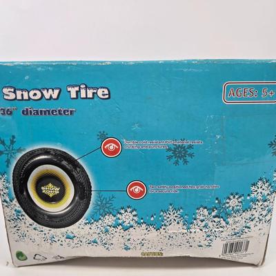 LOT 82: Snow Zone 36-inch Diameter Inflatable Snow Tube and Rubber Bouncing Tube
