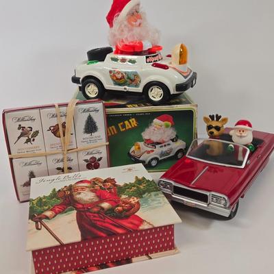 LOT 86: Gemmy Animated Musical Lowrider Car with Santa and Reindeer, Son Ai Santa Claus Cartoon Car Christmas Retro Vintage Toy in Box,...