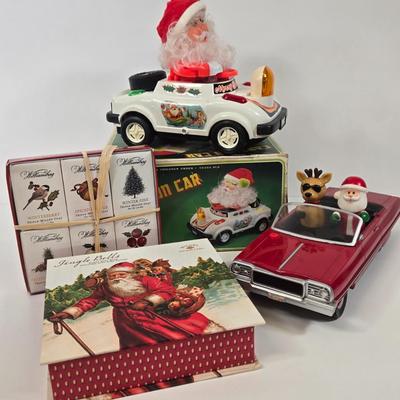 LOT 86: Gemmy Animated Musical Lowrider Car with Santa and Reindeer, Son Ai Santa Claus Cartoon Car Christmas Retro Vintage Toy in Box,...