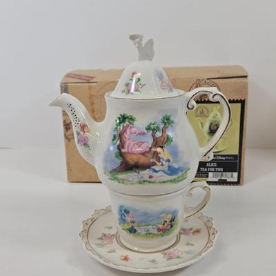 LOT 89: Vintage Fireman Candle, 1996 The Hamilton Collection Spot Takes A Ride, and Disney Parks Alice In Wonderland Tea For One Teapot...