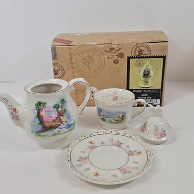 LOT 89: Vintage Fireman Candle, 1996 The Hamilton Collection Spot Takes A Ride, and Disney Parks Alice In Wonderland Tea For One Teapot...