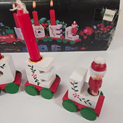 LOT 92: Two Lighted Santa Claus Christmas Window Decor, Two Miniature Noel Candle Trains, and Jolly St Nick Collection Two Jovial Holiday...