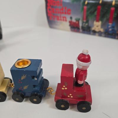 LOT 92: Two Lighted Santa Claus Christmas Window Decor, Two Miniature Noel Candle Trains, and Jolly St Nick Collection Two Jovial Holiday...