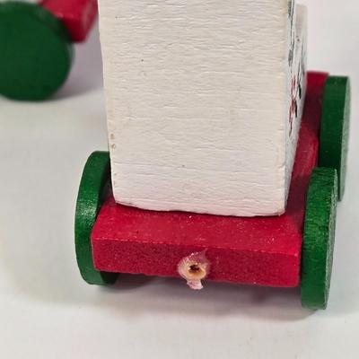 LOT 92: Two Lighted Santa Claus Christmas Window Decor, Two Miniature Noel Candle Trains, and Jolly St Nick Collection Two Jovial Holiday...