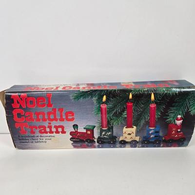 LOT 92: Two Lighted Santa Claus Christmas Window Decor, Two Miniature Noel Candle Trains, and Jolly St Nick Collection Two Jovial Holiday...