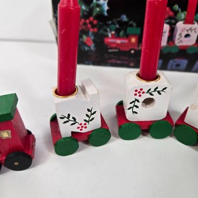 LOT 92: Two Lighted Santa Claus Christmas Window Decor, Two Miniature Noel Candle Trains, and Jolly St Nick Collection Two Jovial Holiday...