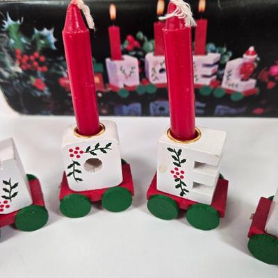 LOT 92: Two Lighted Santa Claus Christmas Window Decor, Two Miniature Noel Candle Trains, and Jolly St Nick Collection Two Jovial Holiday...