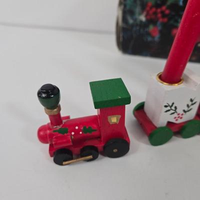 LOT 92: Two Lighted Santa Claus Christmas Window Decor, Two Miniature Noel Candle Trains, and Jolly St Nick Collection Two Jovial Holiday...