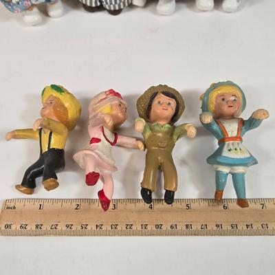 LOT 93: Vintage Country Western Dolls with Crocheted Outfits, Furskins, and More