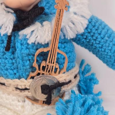 LOT 93: Vintage Country Western Dolls with Crocheted Outfits, Furskins, and More