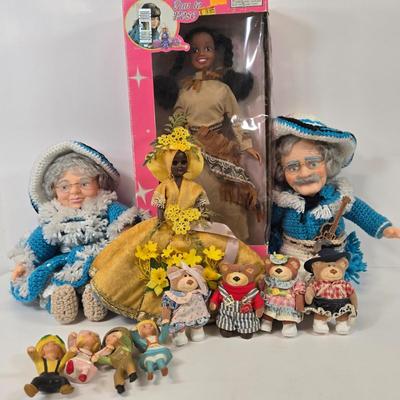 LOT 93: Vintage Country Western Dolls with Crocheted Outfits, Furskins, and More