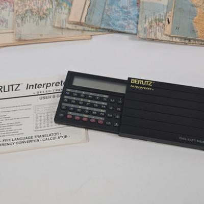 LOT 95: Travel Lot Including Vintage Maps, Brochures, Berlitz Interpreter, Postcards, Stamps, and More