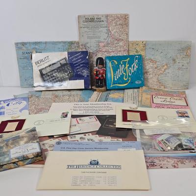 LOT 95: Travel Lot Including Vintage Maps, Brochures, Berlitz Interpreter, Postcards, Stamps, and More