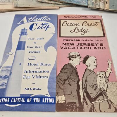 LOT 95: Travel Lot Including Vintage Maps, Brochures, Berlitz Interpreter, Postcards, Stamps, and More