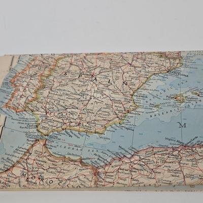 LOT 95: Travel Lot Including Vintage Maps, Brochures, Berlitz Interpreter, Postcards, Stamps, and More