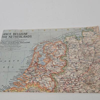 LOT 95: Travel Lot Including Vintage Maps, Brochures, Berlitz Interpreter, Postcards, Stamps, and More