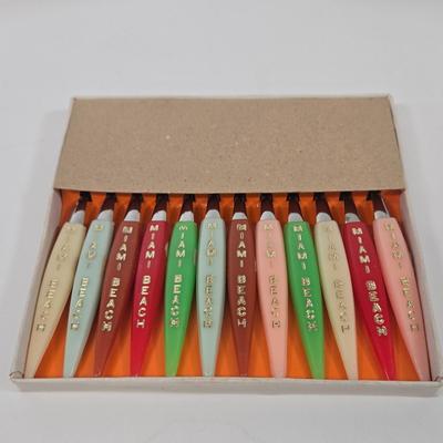 LOT 95: Travel Lot Including Vintage Maps, Brochures, Berlitz Interpreter, Postcards, Stamps, and More