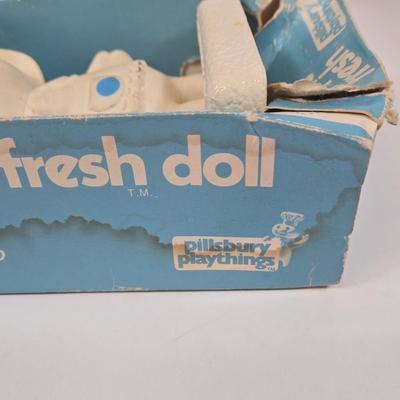 LOT 99: Rita's Mascot Plush Toy, Pillsbury Playthings Poppie Fresh Figure in Original Box, and 1984 Wendy’s Collectors Plate